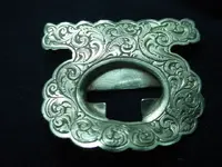 possible Silver buckle smaller.webp
