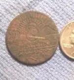 100_5099 back UB coin.webp