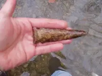 Graham cave from sch. in hand.webp