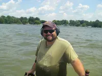 Mike smiling like he found something good resized.webp