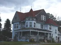 old house across from mill.webp