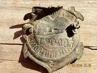 Back of war service badge.webp