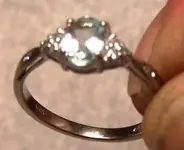 white gold blue stone ring.webp