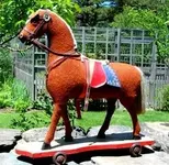 AntiqueStrawStuffedHorse.webp