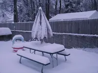 snowy picnic table.webp