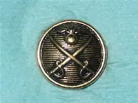 button crossed sword and cannonball.webp