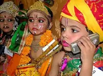 indian_kids_mobile_phone.webp