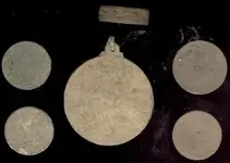 medal and ring dirty.webp