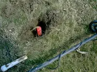 Trowel in hole one 12 inches.webp