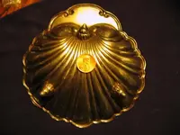 silver dish bottom.webp