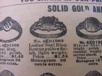 rings seal gold shield.webp