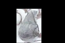 Powder Flask cropped 6-25-06.webp