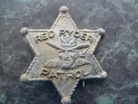 red ryder badge.webp