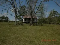 Old Home on Old River where Ean is fishing..webp