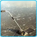 sand flea rake in use.webp