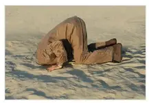 man in sand.webp
