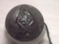 MYSTERY BUTTON FRONT.webp