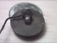 MYSTERY BUTTON BACK.webp