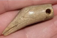 pendantbirdhead2.webp