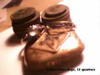 2 silver rings & 15 quarters.webp
