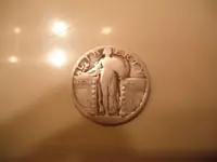 Libert Quarter Obverse.webp