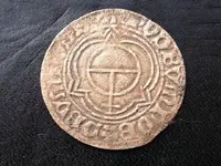 TomCoin2.webp