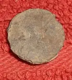 pewter button.webp