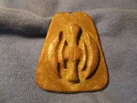 bronzependantreverse.webp