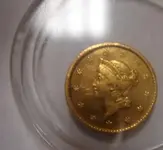 $1 gold front.webp