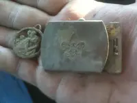 buckle and medal.webp