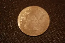 1876 seated 005.webp