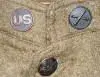WW I US Crossed Field Artillery collar disc.webp