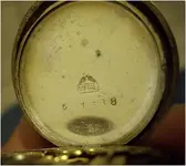 antique pocket watch inside 3.webp