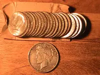 solid roll and peace dollar.webp