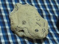 frog with carved V shape in the head.jpg