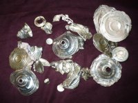Sterling Silver Skins from three different makers of candlestick holders.JPG