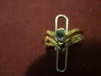 56-14kt 1-4 ct with 6 diamonds in band.webp