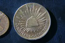 8reales_front.webp