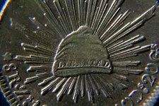 8reales_frontXL1.webp