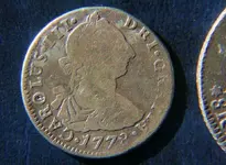 2reales_front.webp