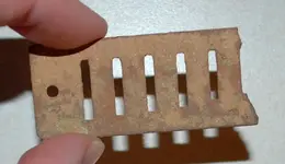 metal slotted thing.webp
