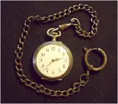 silver pocket watch.webp