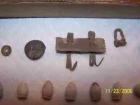 eagle button and strange relic.webp