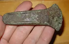 bronze age axe head.webp