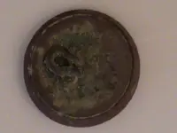 back side of coat button.webp