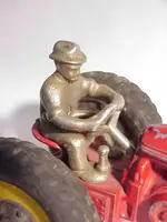 Vintage Toy Tractor Driver.webp