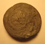 Winged wheel button front view.webp