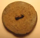 Winged wheel button back.webp
