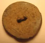 Winged wheel button back.webp