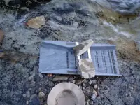 sluice in creek material.webp